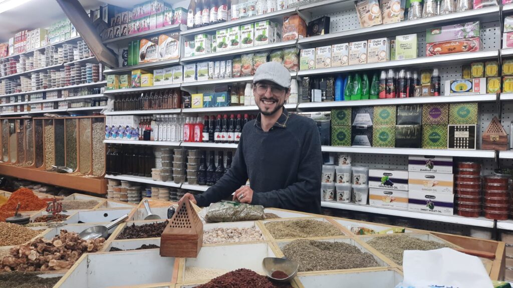 Izzeldin in a spice shop